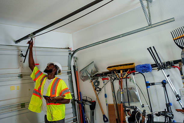 Professional Garage Door Panel Replacement technician working in Roseau, MN